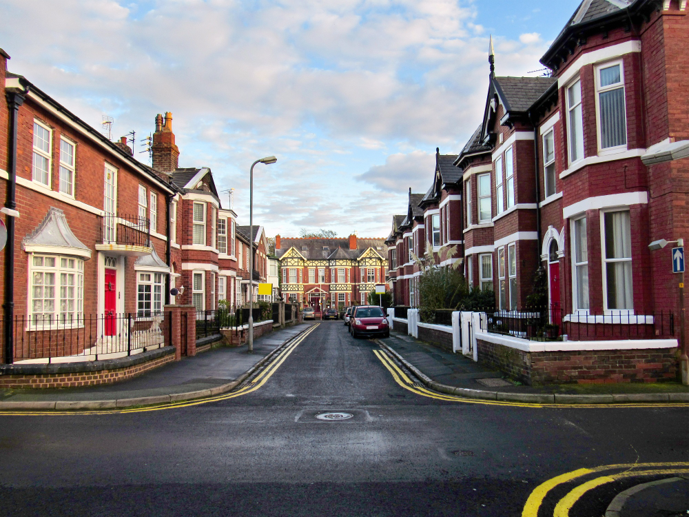 crossing-road-old-red-brick-buildings